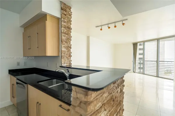 a view of kitchen and utility room