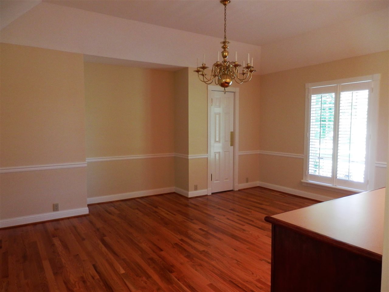 469 Coleytown Road Waynesboro, VA 22980 - Photo 8 of 47 a view of an empty room with wooden floor and a window