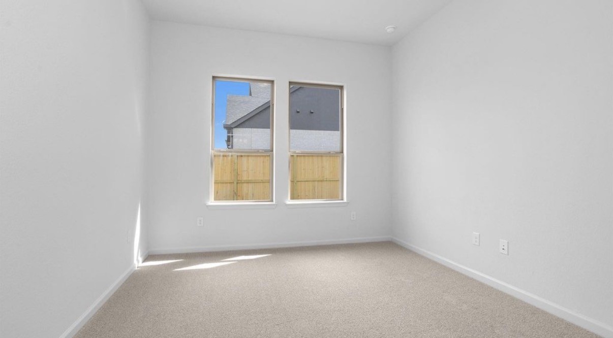 303 Eileen Drive Rosenberg, TX 77471 - Photo 10 of 17 an empty room with a window