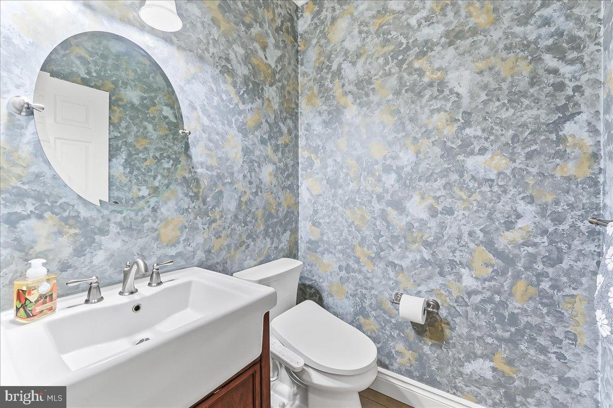 3826 Marsh Road Garnet Valley, PA 19060 - Photo 16 of 35 Elegant powder room with artistic wall design.