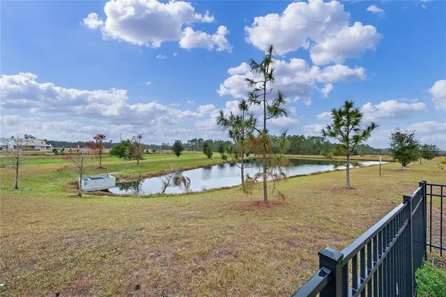 an aerial view of residential houses and outdoor space