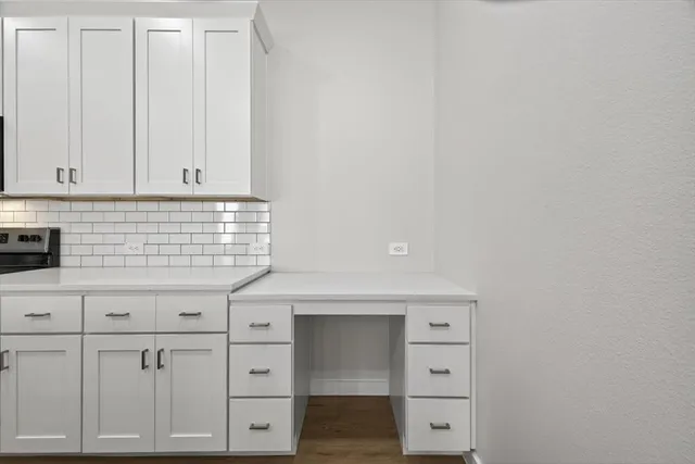 a view of small space with racks on the wall