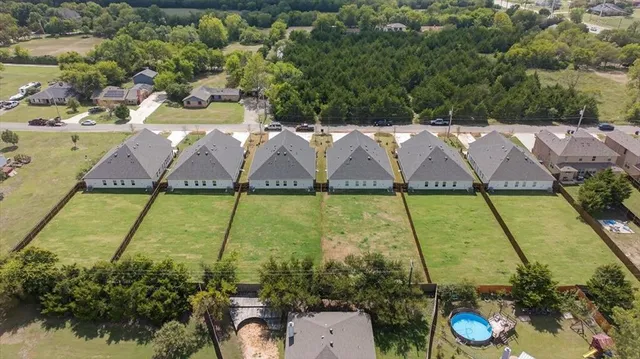 a picture of a wooden floor with glass windows