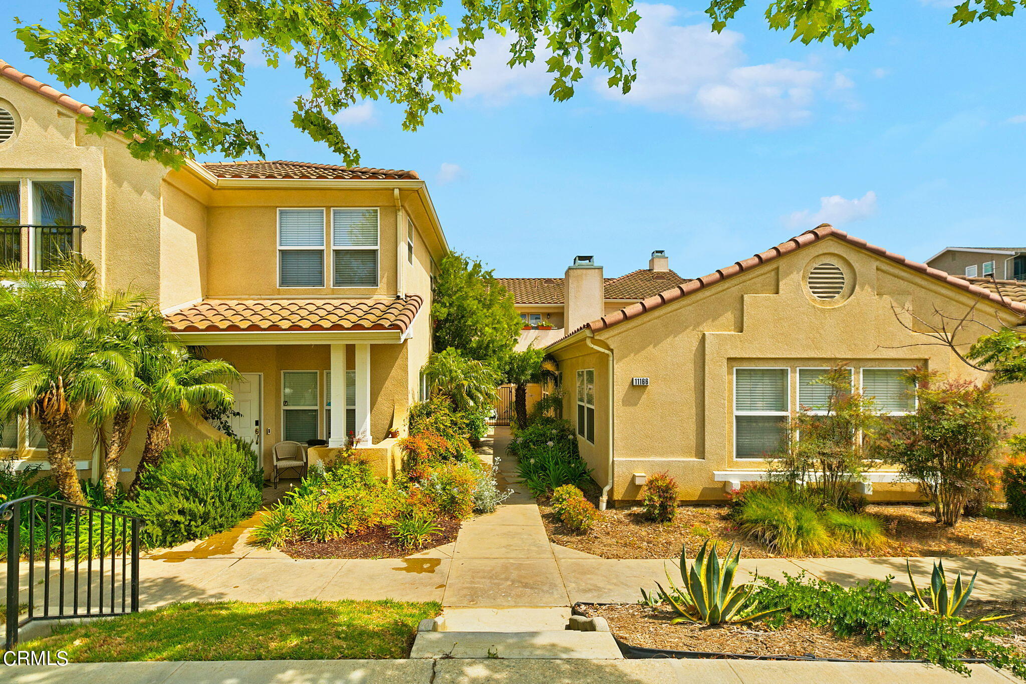 11172 Darling Road Ventura, CA 93004 - Photo 1 of 31 a front view of a house with a yard