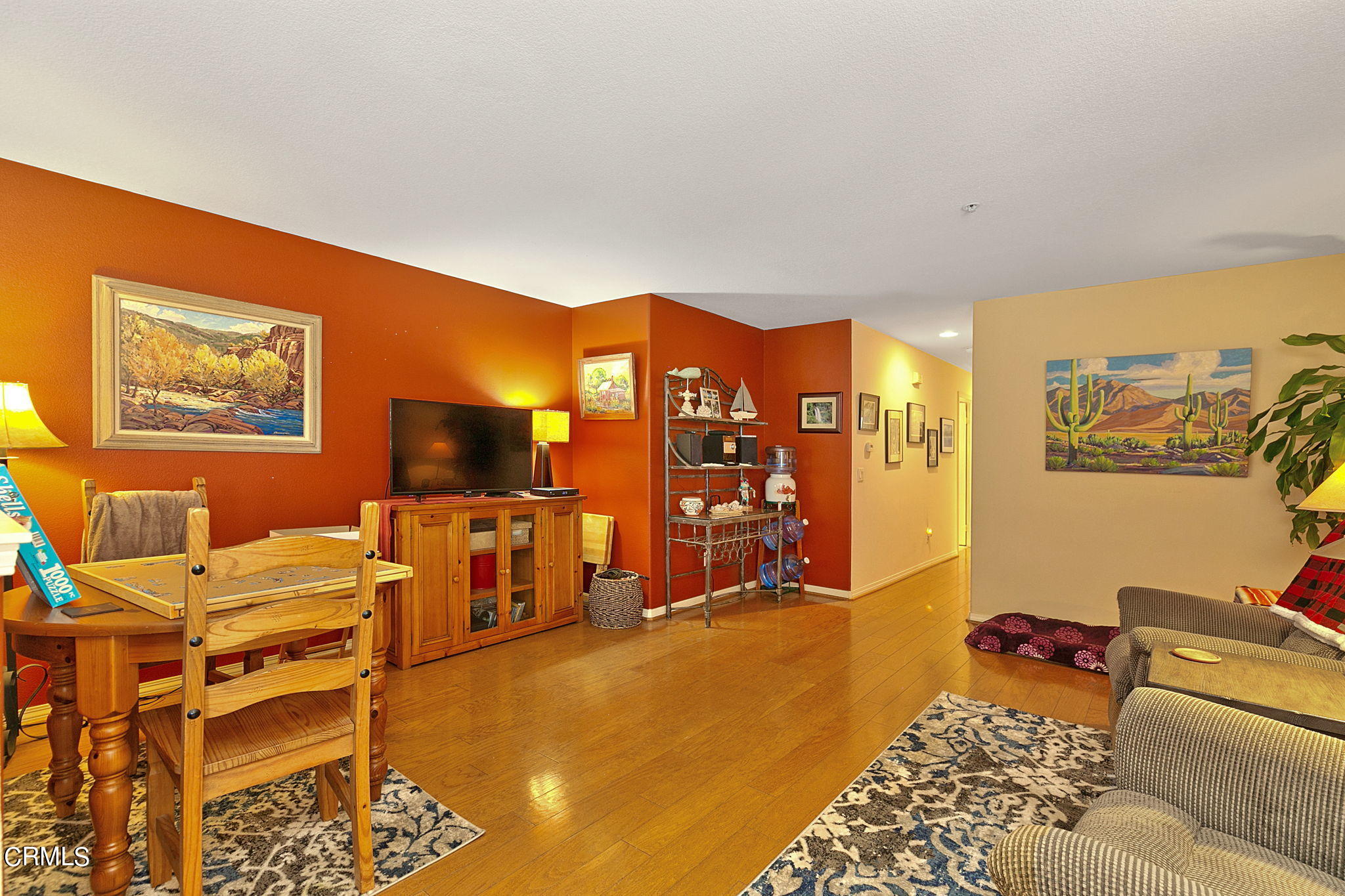 11172 Darling Road Ventura, CA 93004 - Photo 18 of 31 a living room with furniture and a flat screen tv