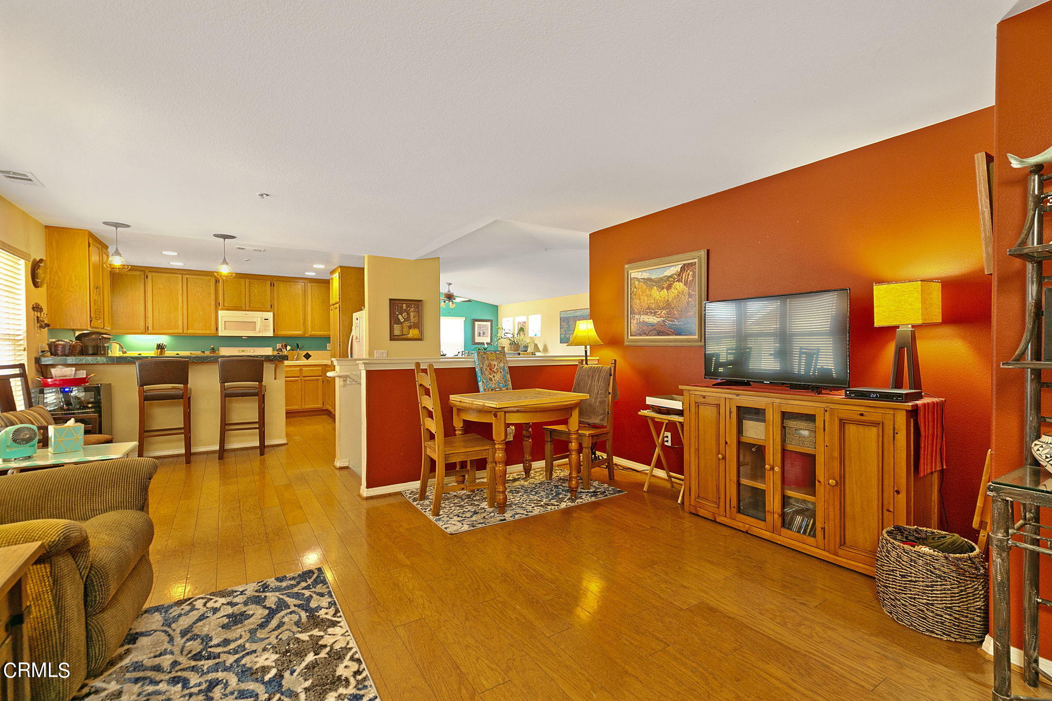 11172 Darling Road Ventura, CA 93004 - Photo 19 of 31 a living room with furniture and flat screen tv