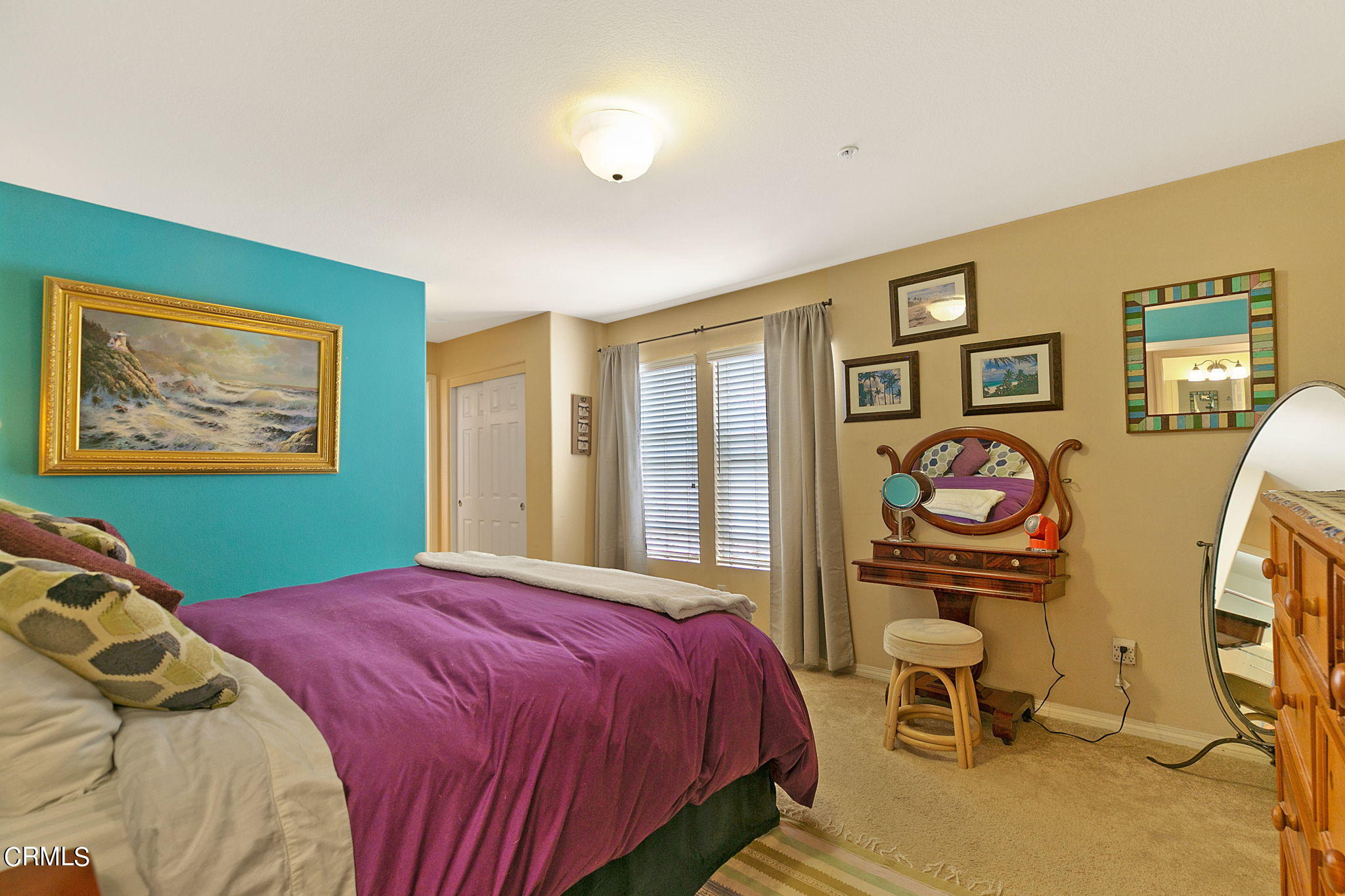 11172 Darling Road Ventura, CA 93004 - Photo 22 of 31 a bedroom with a bed and painting on the wall