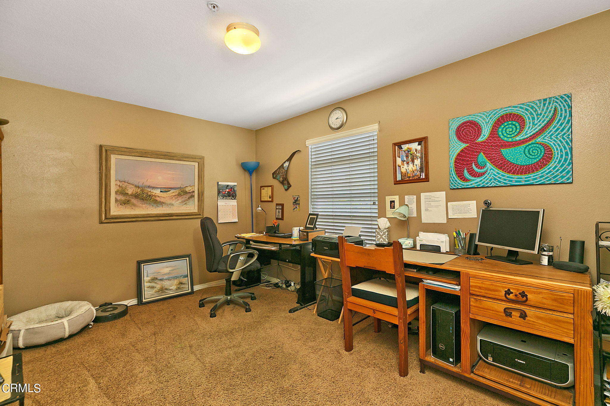 11172 Darling Road Ventura, CA 93004 - Photo 26 of 31 a room with furniture and a flat screen tv