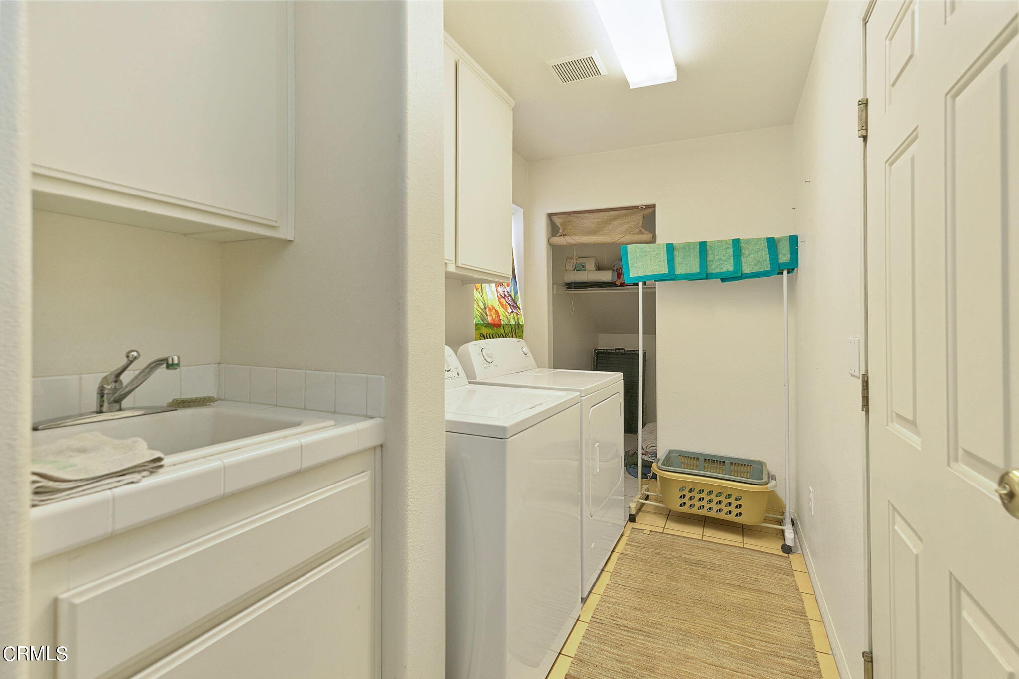 11172 Darling Road Ventura, CA 93004 - Photo 28 of 31 a bathroom with a sink and a mirror