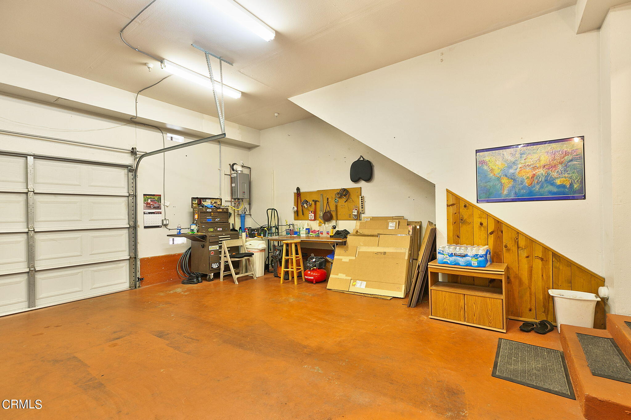11172 Darling Road Ventura, CA 93004 - Photo 30 of 31 a living room with furniture and a flat screen tv