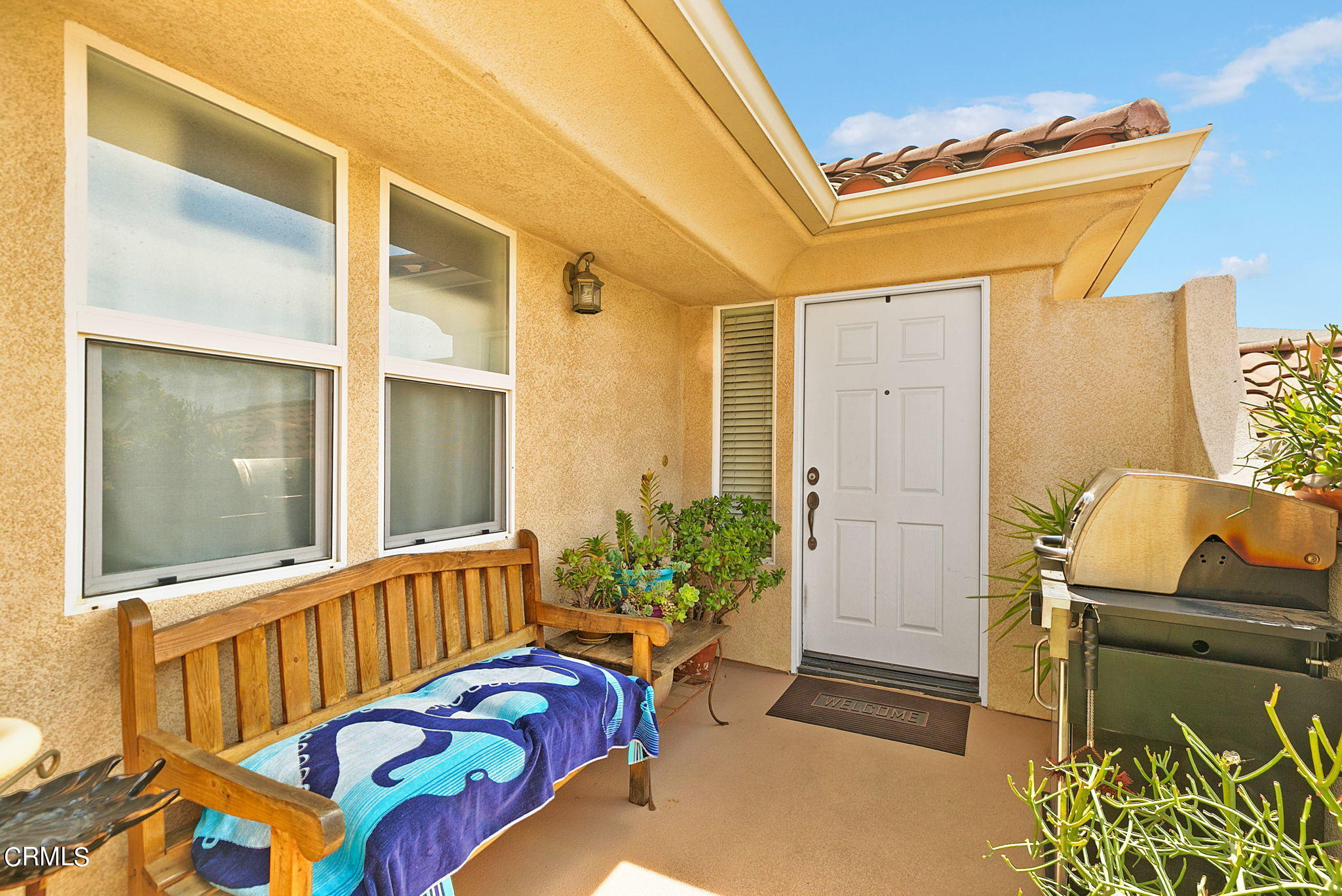 11172 Darling Road Ventura, CA 93004 - Photo 4 of 31 a balcony with furniture and a potted plant