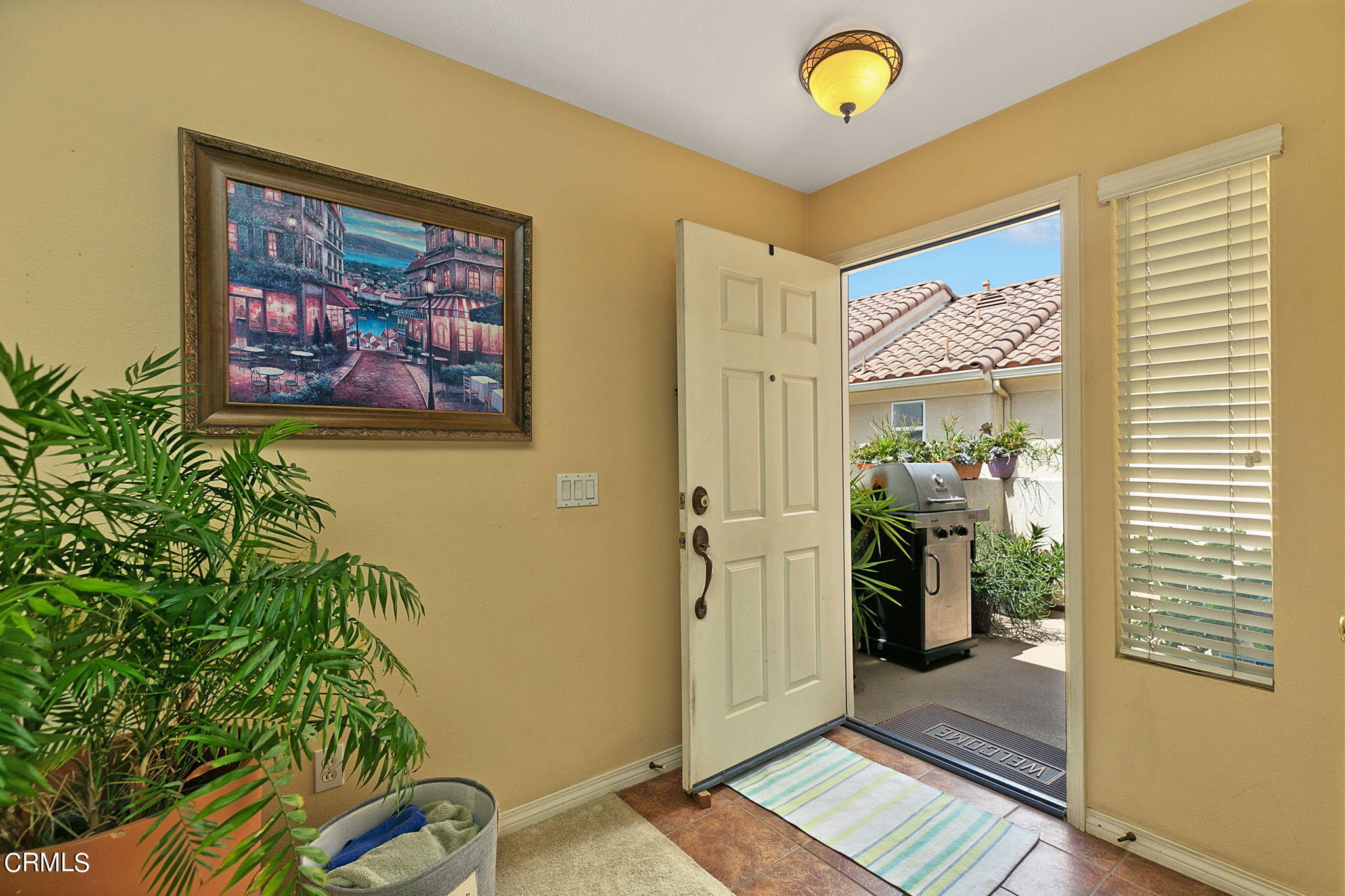 11172 Darling Road Ventura, CA 93004 - Photo 5 of 31 a view of a bedroom with furniture and front door