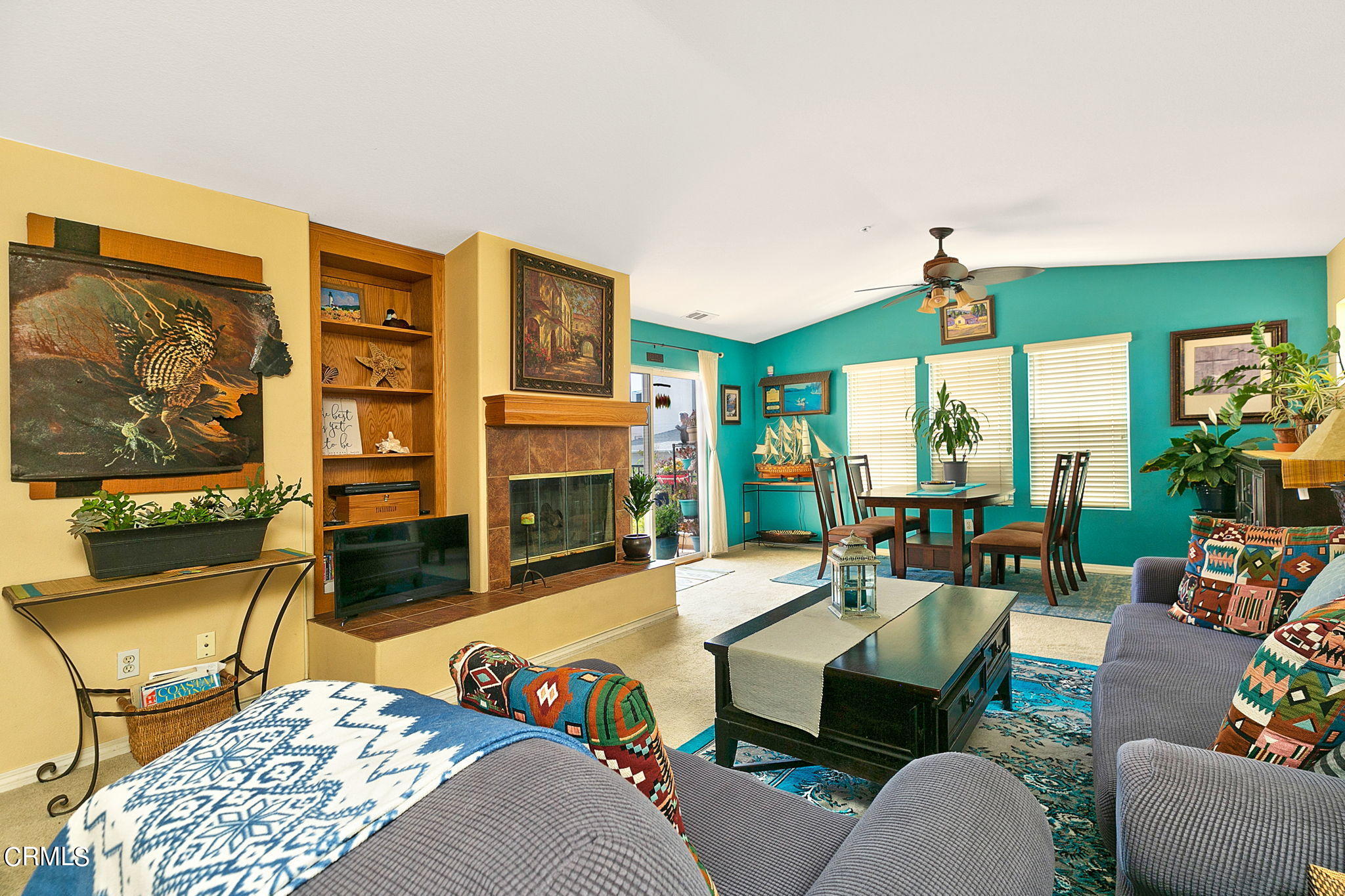11172 Darling Road Ventura, CA 93004 - Photo 6 of 31 a living room with fireplace furniture and a large window