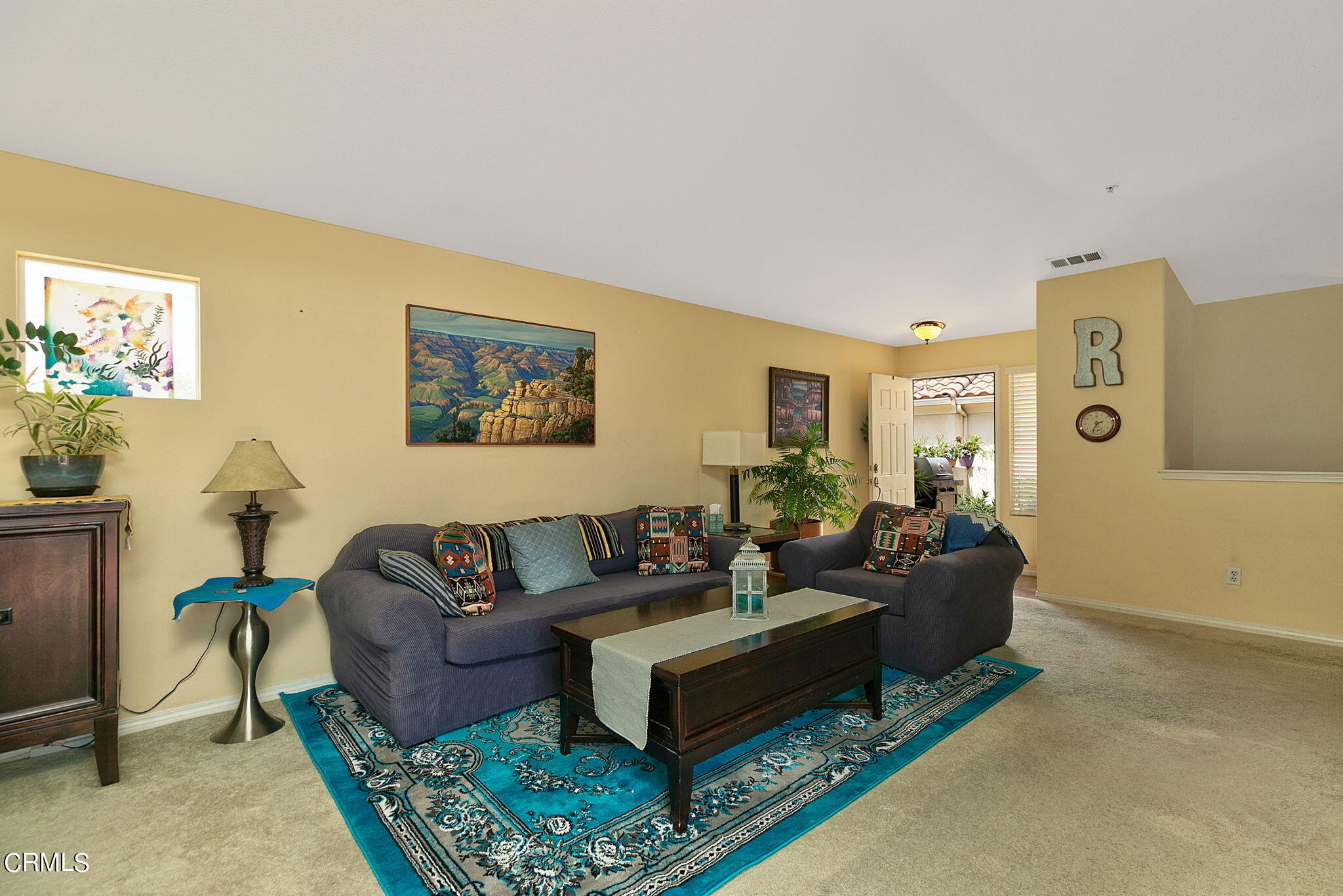 11172 Darling Road Ventura, CA 93004 - Photo 8 of 31 a living room with furniture and a rug