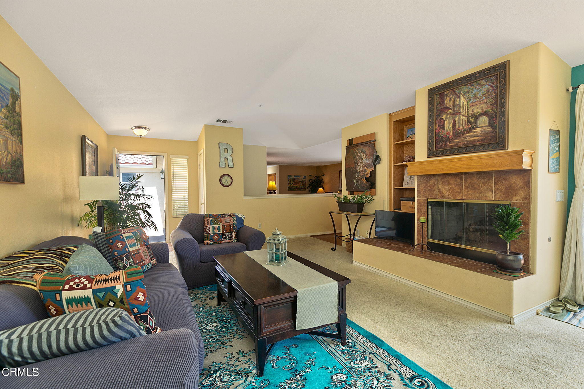 11172 Darling Road Ventura, CA 93004 - Photo 9 of 31 a living room with furniture and a fireplace