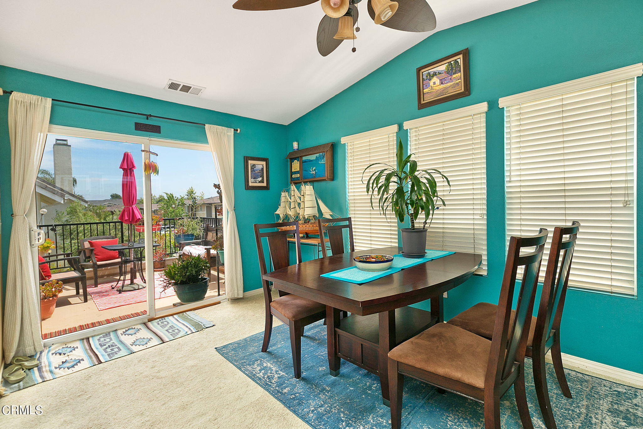 11172 Darling Road Ventura, CA 93004 - Photo 10 of 31 a dining room with furniture and a potted plant
