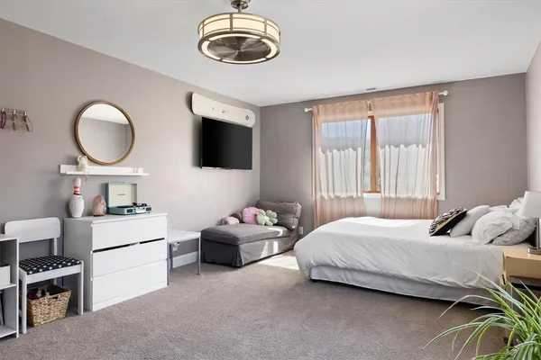 a view of a workspace with furniture