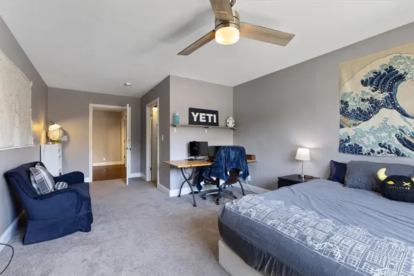 a view of a livingroom with furniture and window