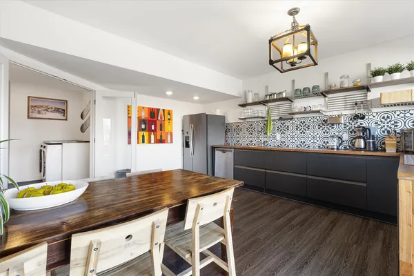 a workspace with furniture and wooden floor