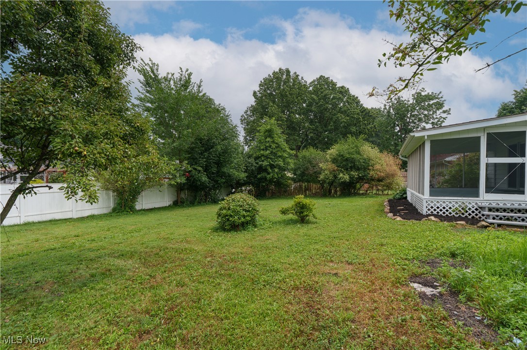 2783 Shellhart Road Barberton, OH 44203 - Photo 4 of 24 View of yard featuring a sunroom