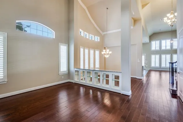 a view of an entryway with wooden floor