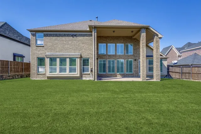 a view of a house with a garden