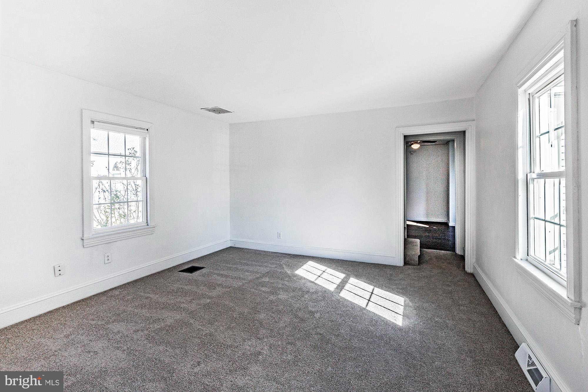 56 Main Street Hancocks Bridge, NJ 08038 - Photo 12 of 33 an empty room with windows