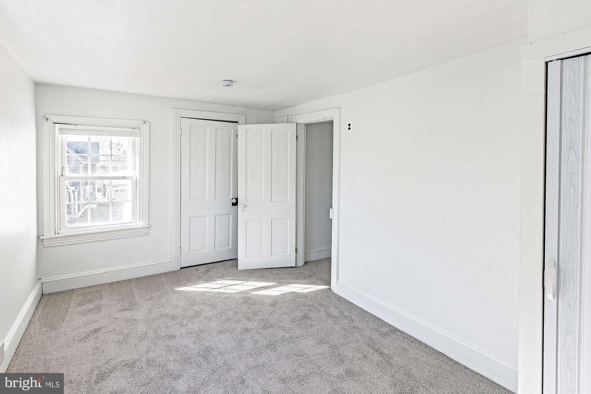 56 Main Street Hancocks Bridge, NJ 08038 - Photo 20 of 33 a view of an empty room with a window