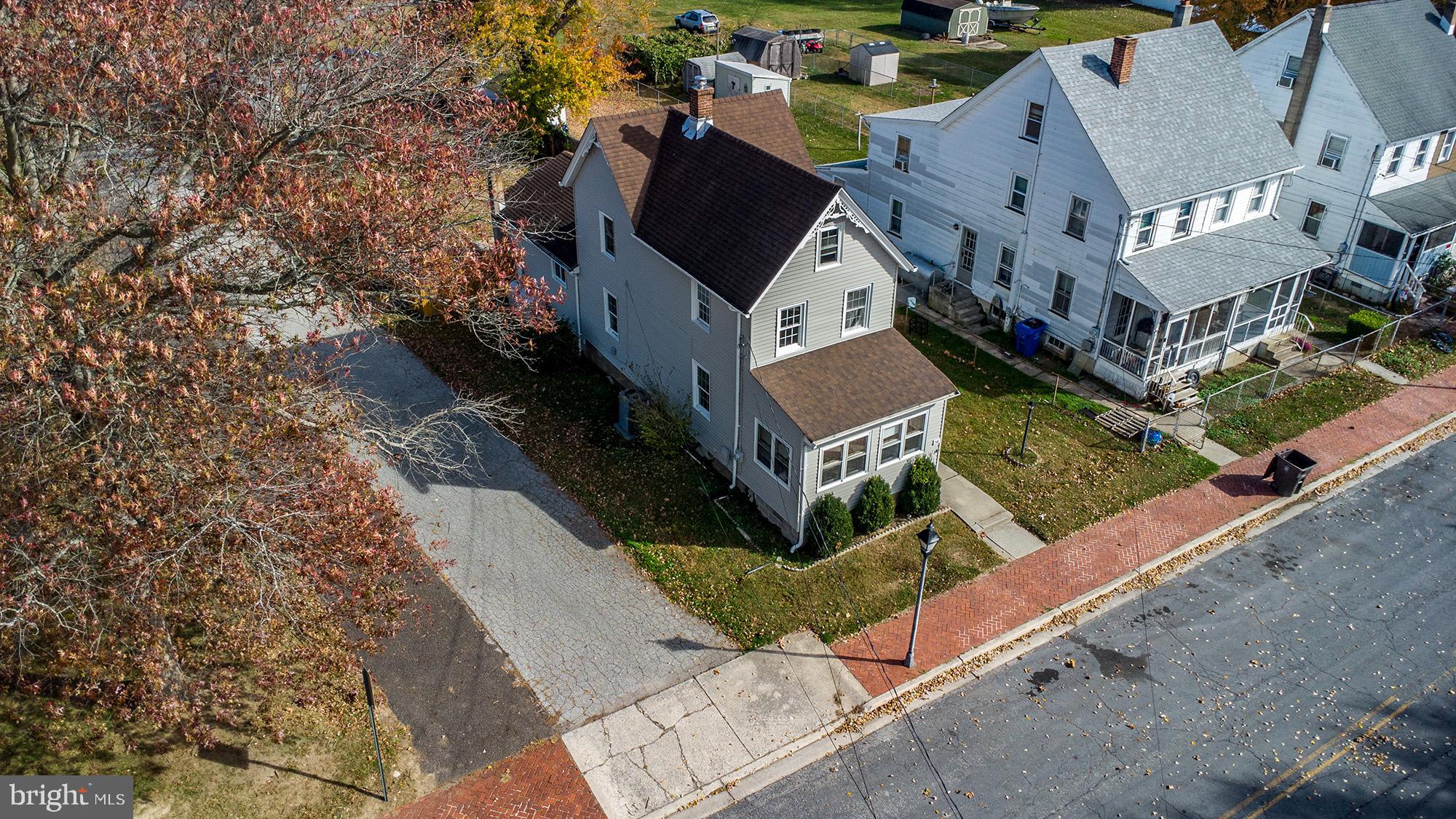 56 Main Street Hancocks Bridge, NJ 08038 - Photo 25 of 33 an aerial view of multiple houses with yard