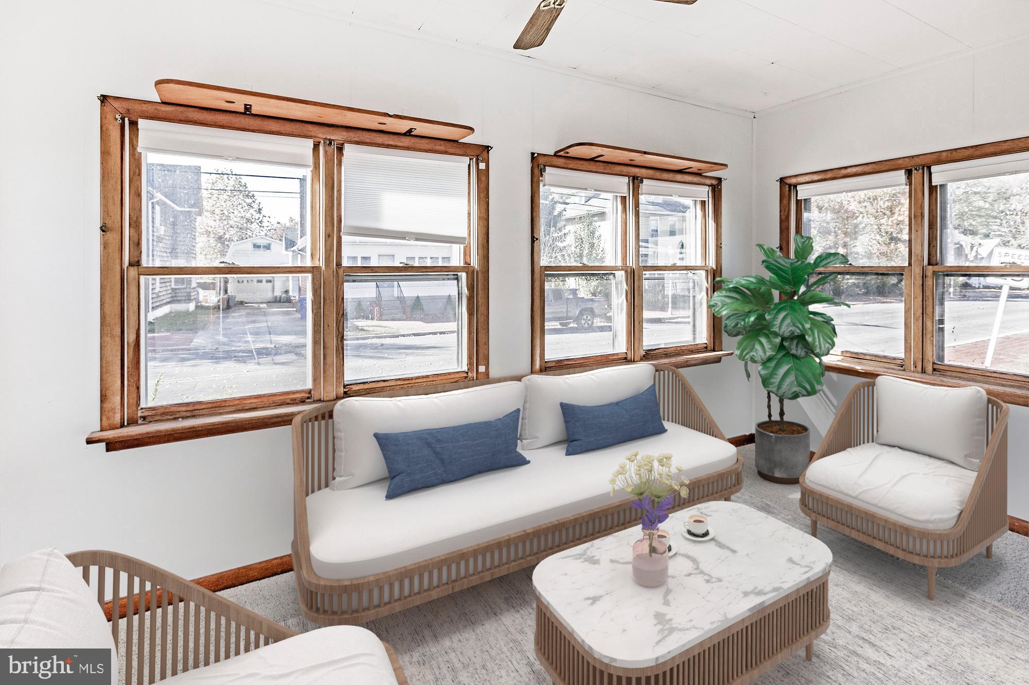 56 Main Street Hancocks Bridge, NJ 08038 - Photo 28 of 33 a living room with furniture and a window