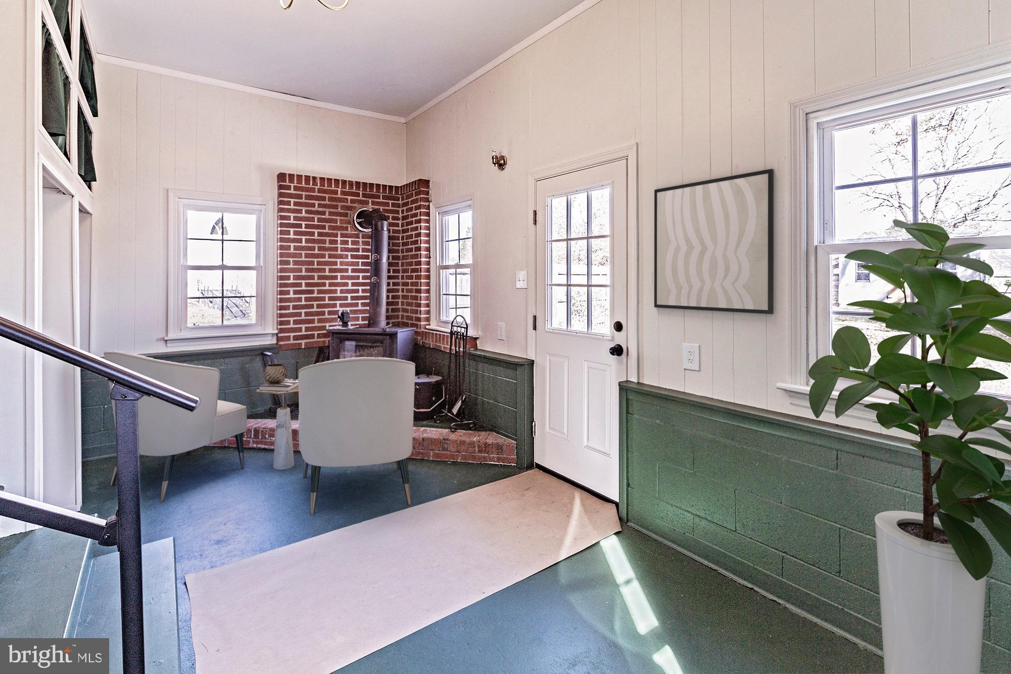 56 Main Street Hancocks Bridge, NJ 08038 - Photo 29 of 33 a living room with furniture and a potted plant