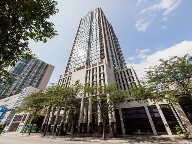 1122 North Clark Street, Unit 1203 Chicago, IL 60610 - Photo 1 of 22 a view of a tall building