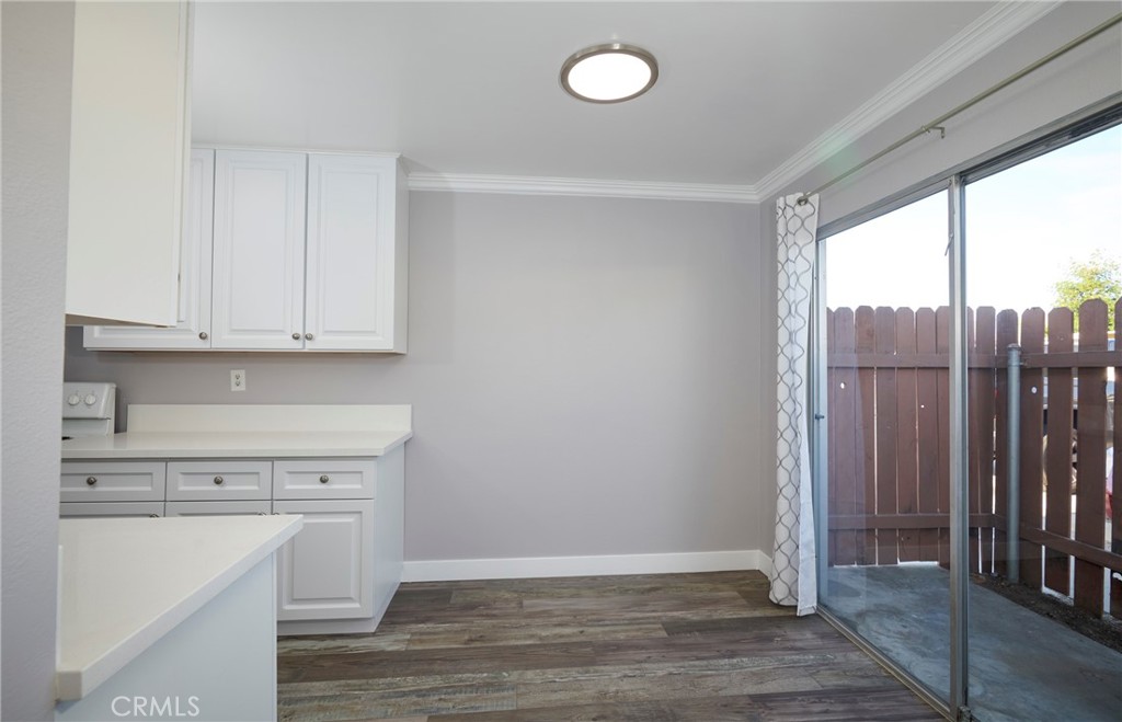 4723 Jackson Street, Unit 28 Riverside, CA 92503 - Photo 16 of 33 a view of cabinets with wooden floor
