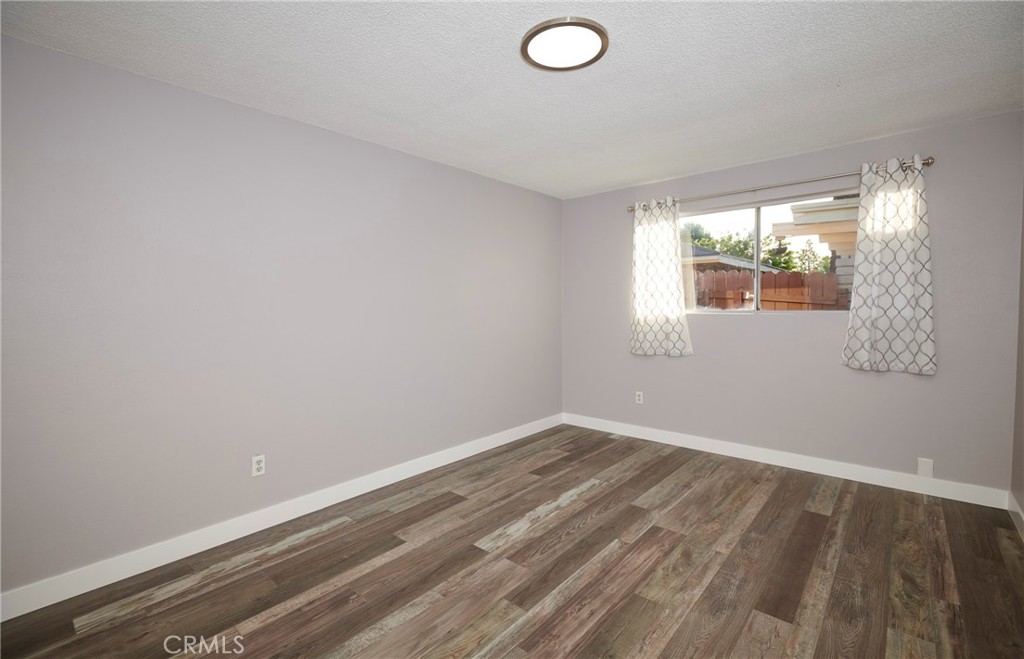 4723 Jackson Street, Unit 28 Riverside, CA 92503 - Photo 25 of 33 an empty room with a window