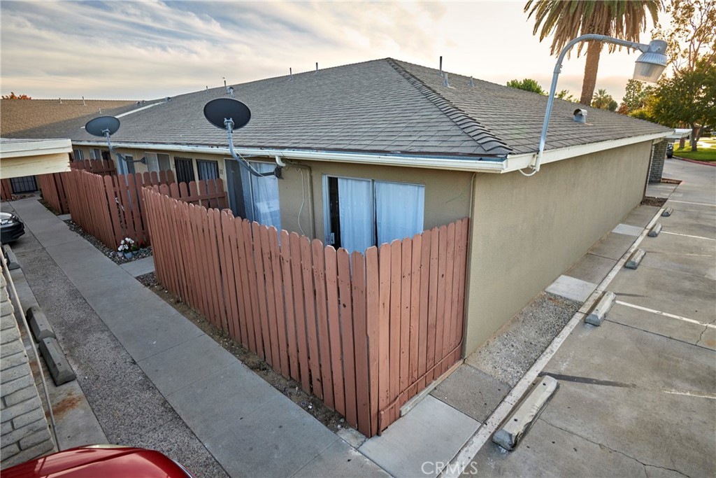 4723 Jackson Street, Unit 28 Riverside, CA 92503 - Photo 4 of 33 a view of a house with a backyard