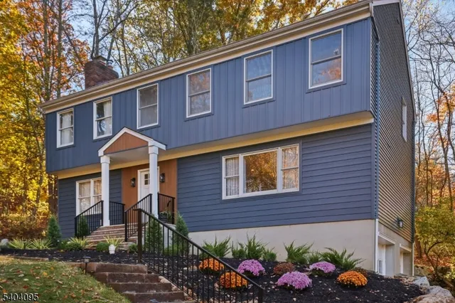 a front view of a house with an outdoor space