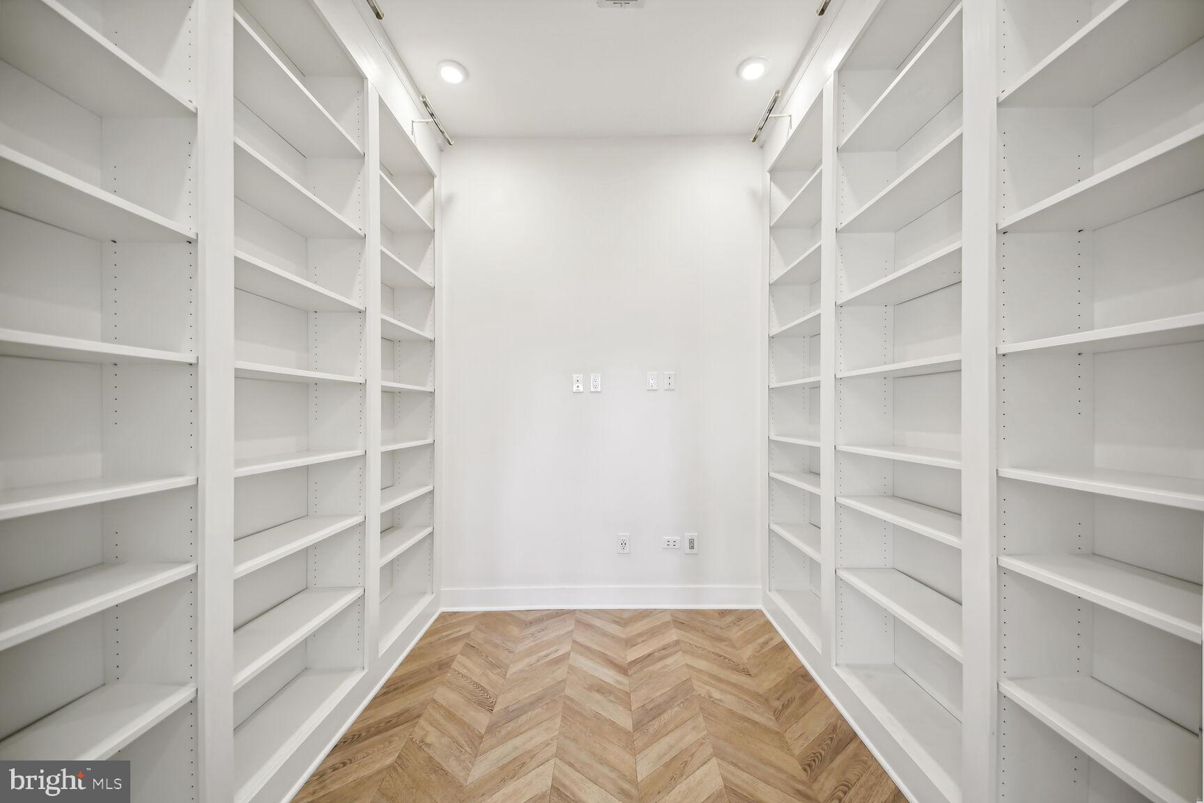 2012 D Street Northeast, Unit 3 Washington, DC 20002 - Photo 16 of 20 a view of a room with shelves on the wall