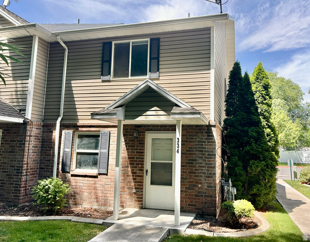 334 West Rodeo Lane South Logan, UT 84321 - Photo 1 of 12 Two-story facade featuring brick and siding construction