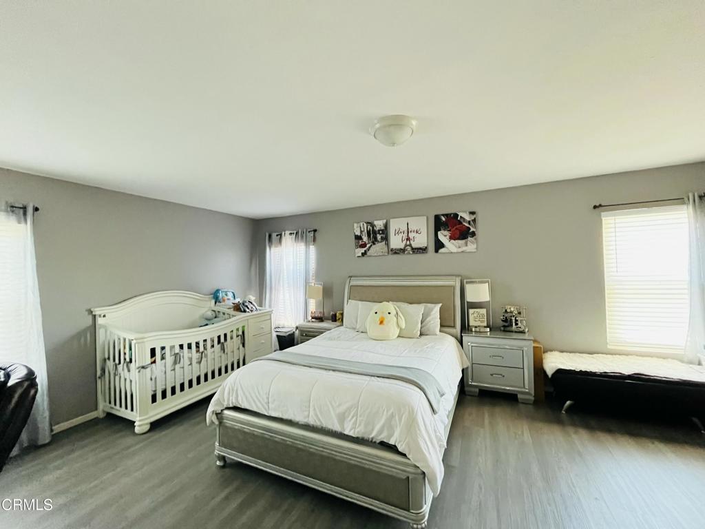 40339 Pantano Road Palmdale, CA 93550 - Photo 11 of 11 a bedroom with two beds and a window