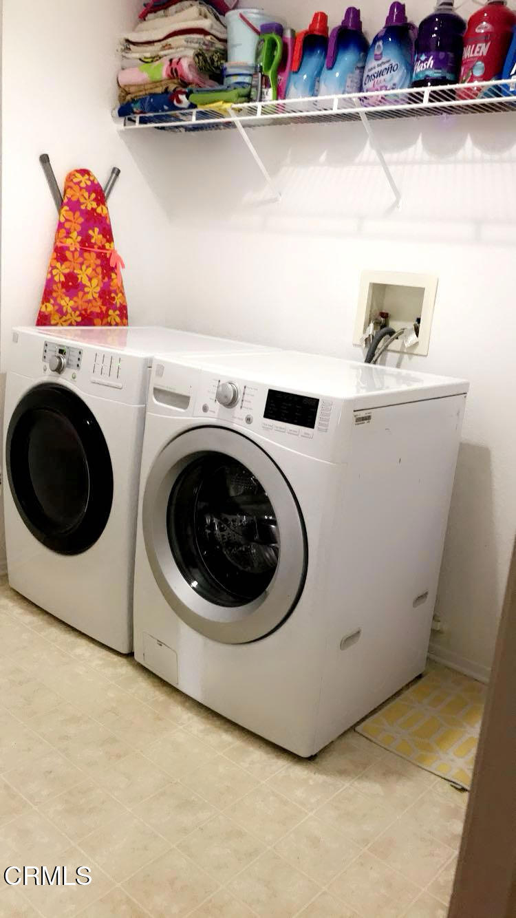 40339 Pantano Road Palmdale, CA 93550 - Photo 3 of 11 a utility room with dryer and washer