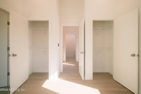 a view of a bathroom with a glass door