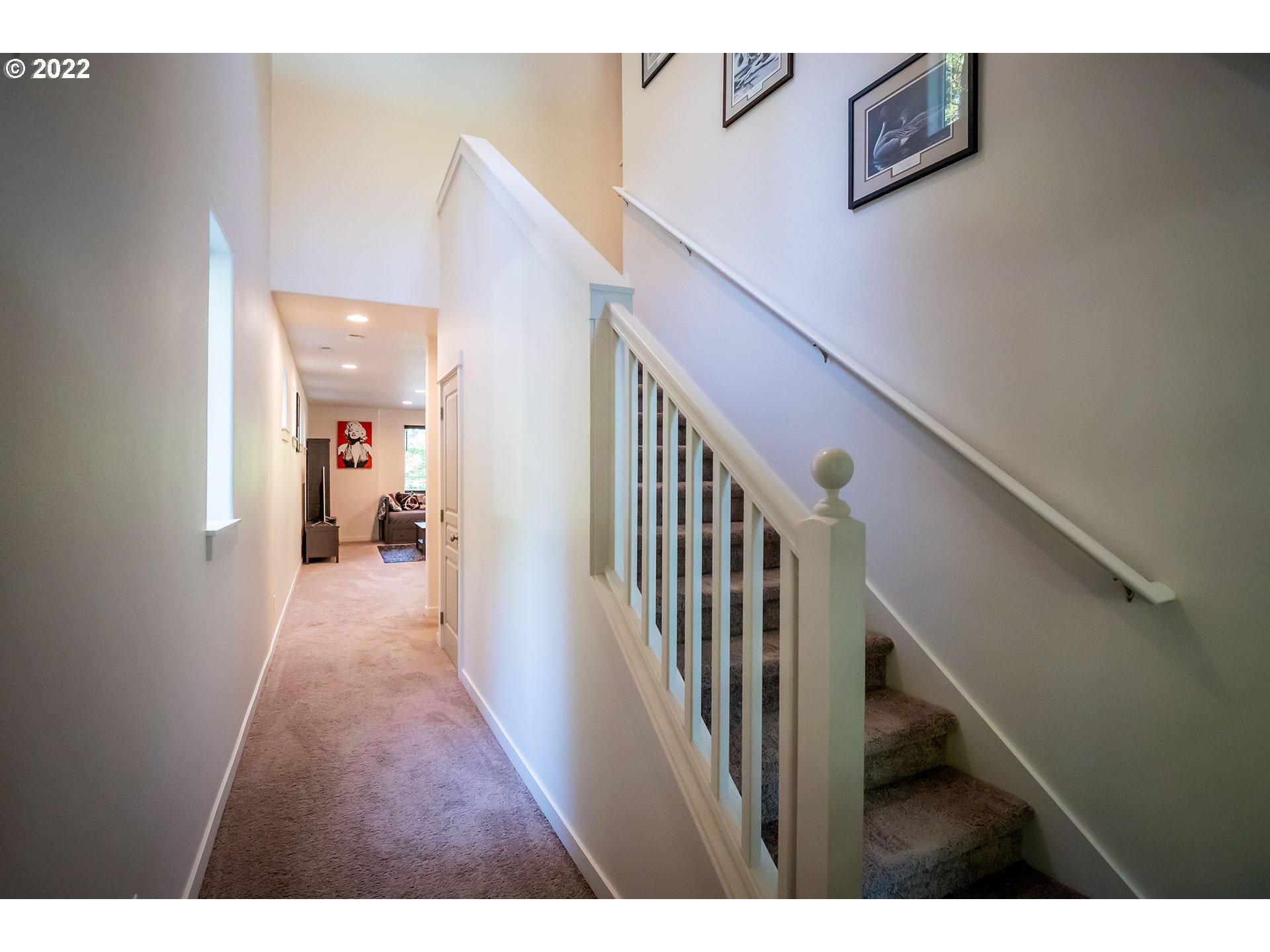 1345 Skyline Park Loop Eugene, OR 97405 - Photo 2 of 31 a view of a hallway with wooden floor and staircase
