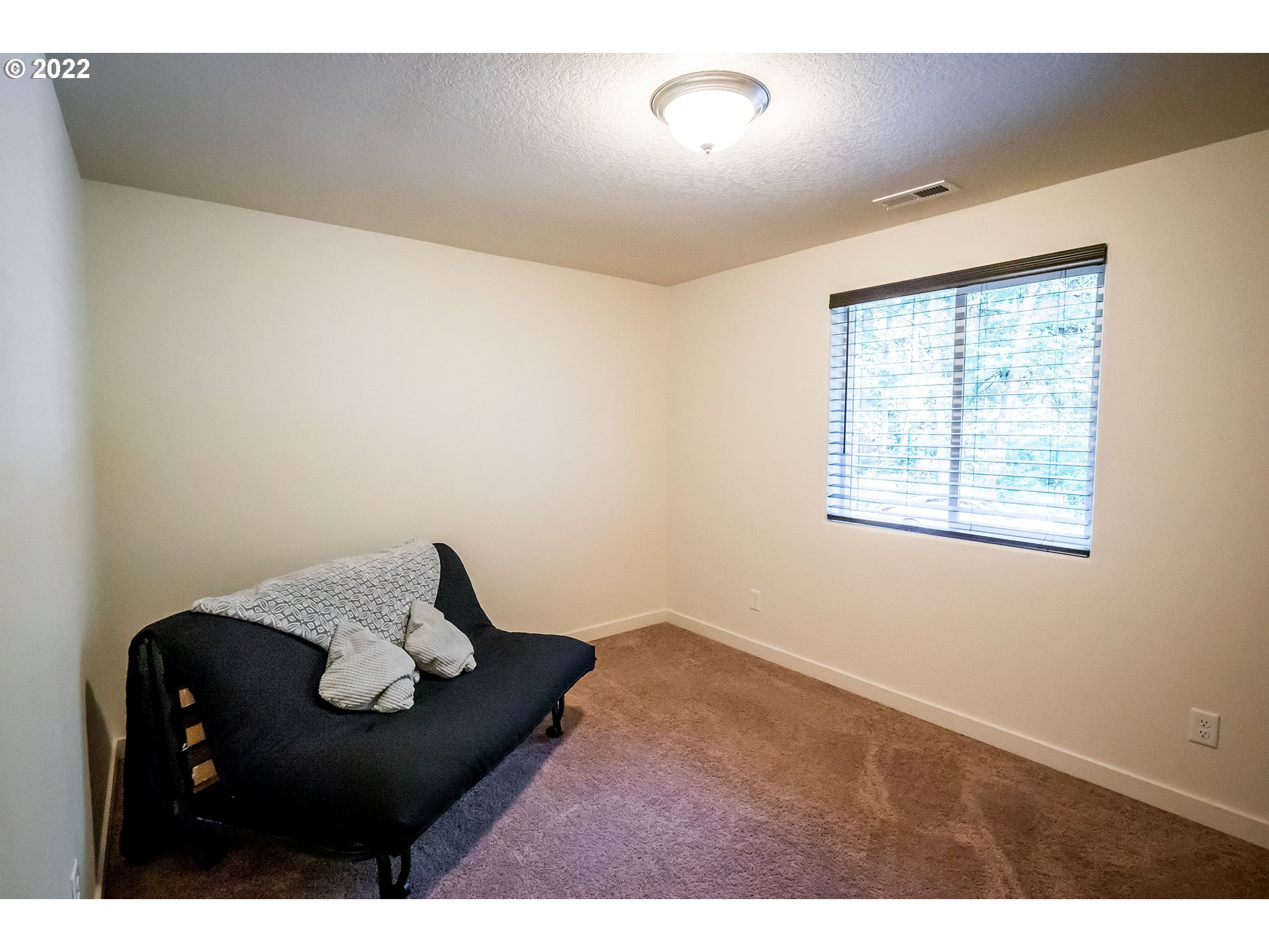 1345 Skyline Park Loop Eugene, OR 97405 - Photo 21 of 31 a living room with furniture and a window