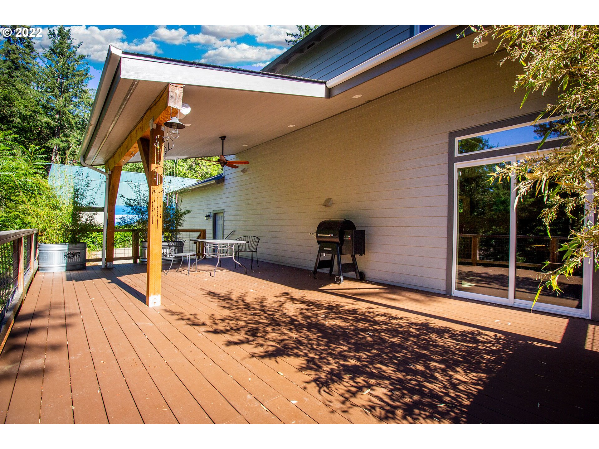 1345 Skyline Park Loop Eugene, OR 97405 - Photo 25 of 31 a view of a house with backyard porch and sitting area