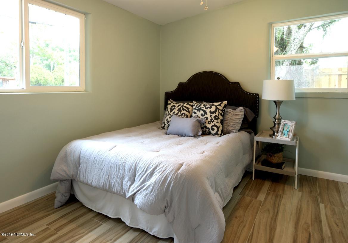 1730 Cortez Road Jacksonville, FL 32246 - Photo 17 of 28 a bedroom with a bed and a window