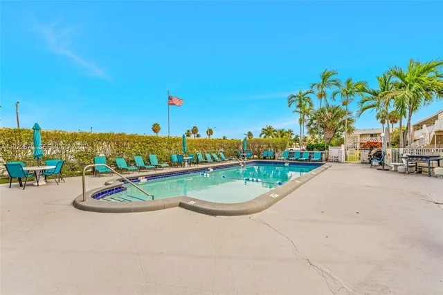 a view of a park with palm trees