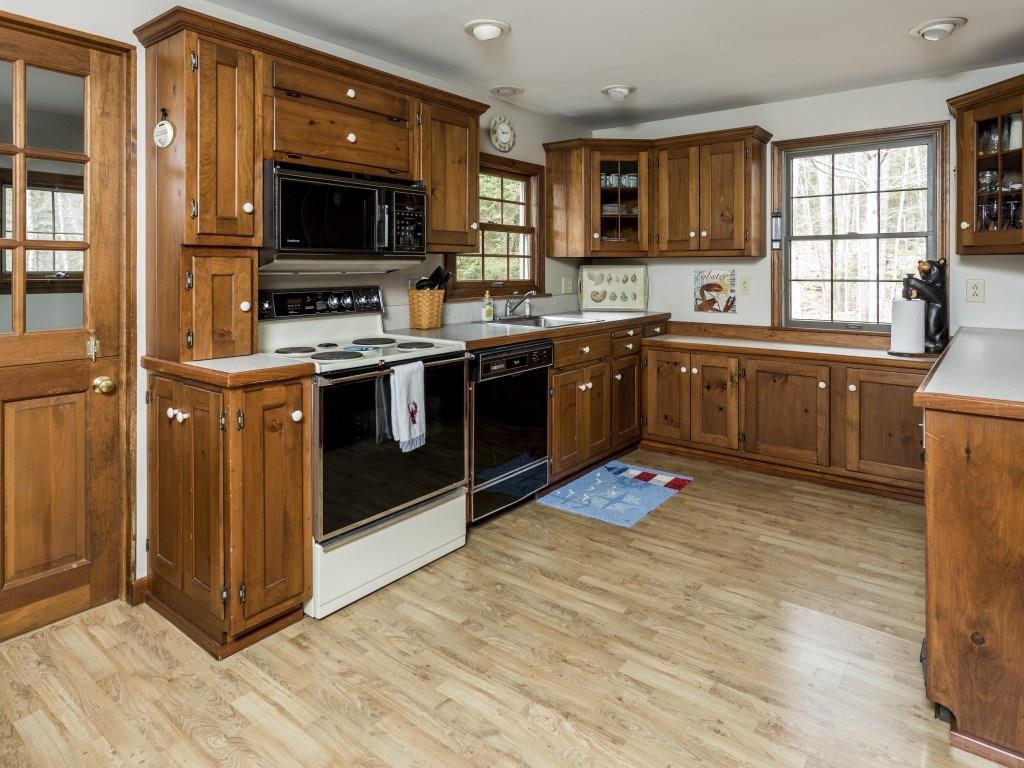 9 The Ledges Trevett, ME 04571 - Photo 6 of 34 The kitchen with wood cabinets over...