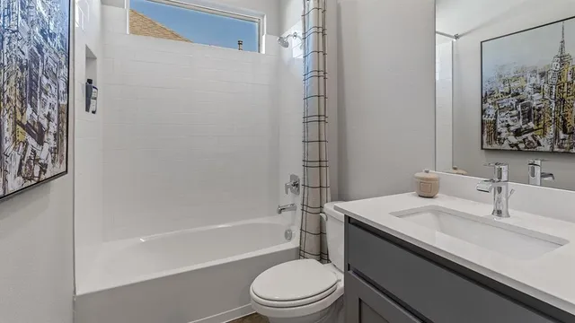 a bedroom with a bed and cupboard