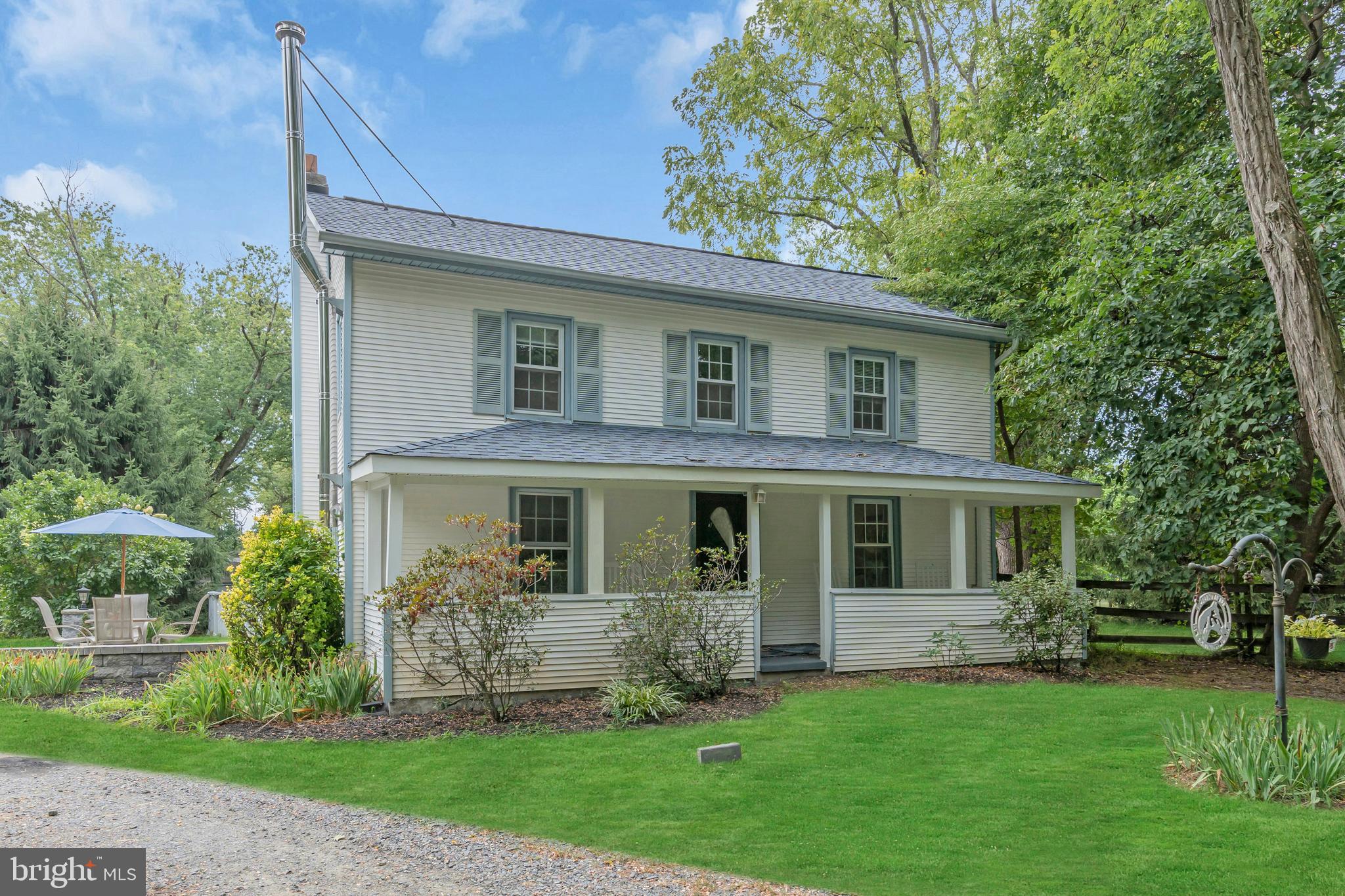 14 Maxim Road Howell, NJ 07731 - Photo 14 of 55 a front view of a house with a garden
