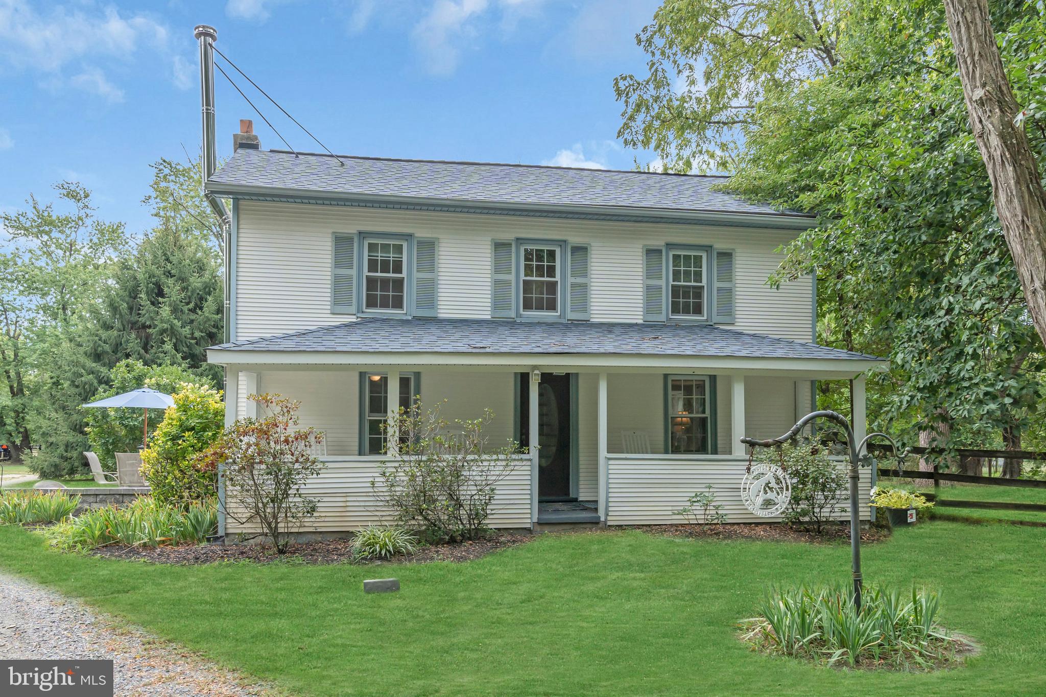 14 Maxim Road Howell, NJ 07731 - Photo 15 of 55 a front view of a house with a garden